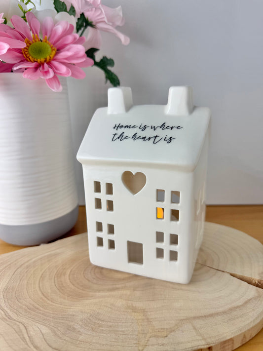 White ceramic candle house
