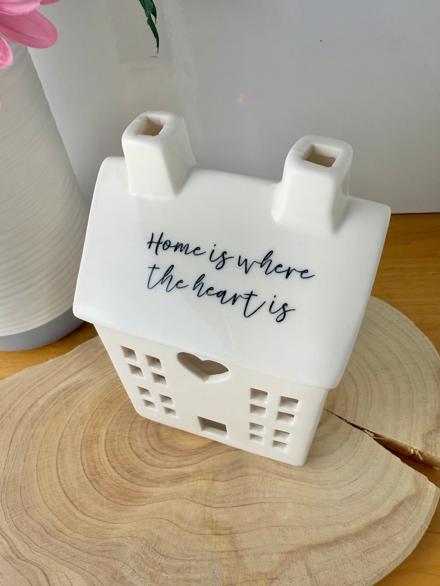 White ceramic candle house