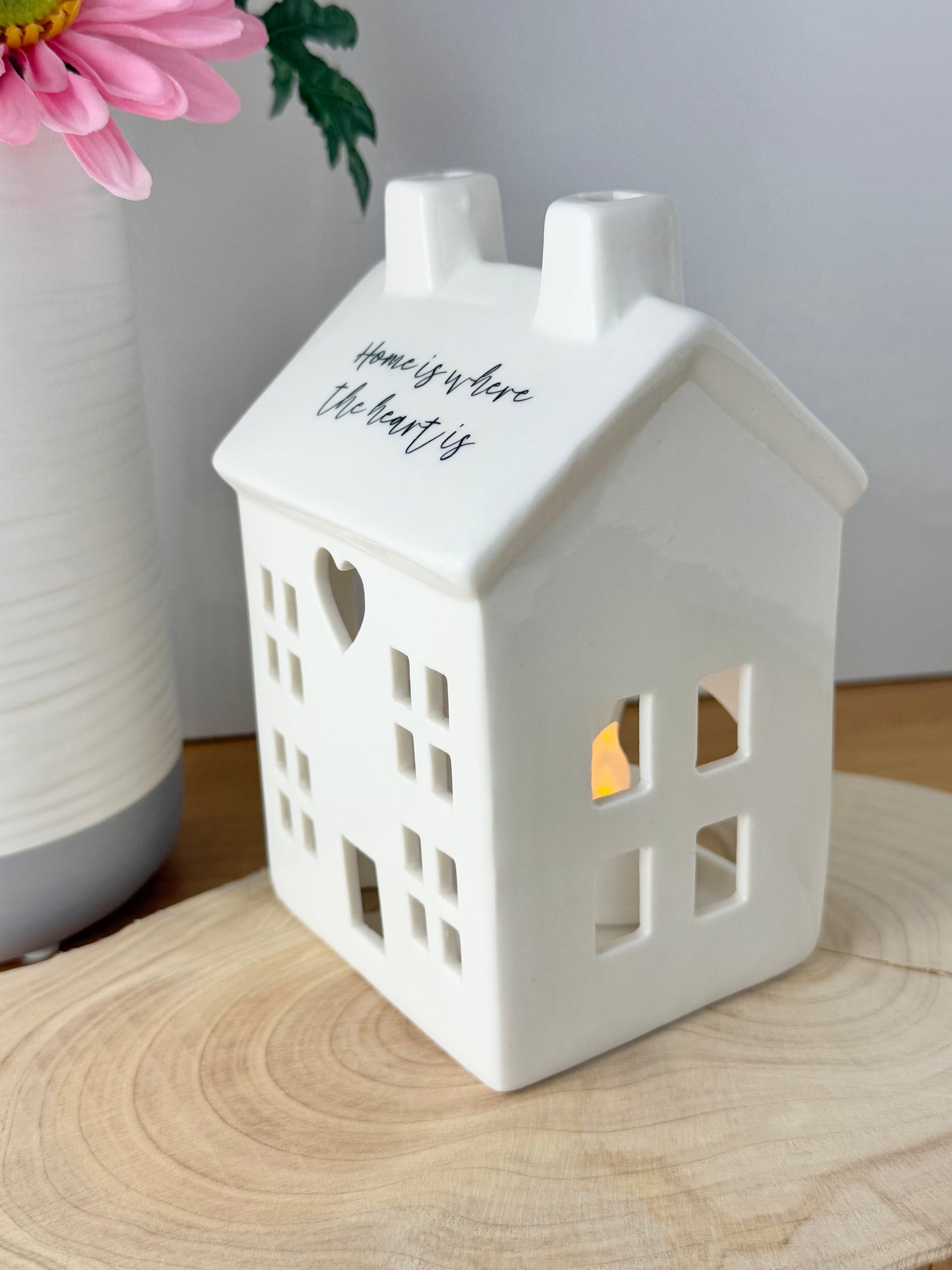 White ceramic candle house