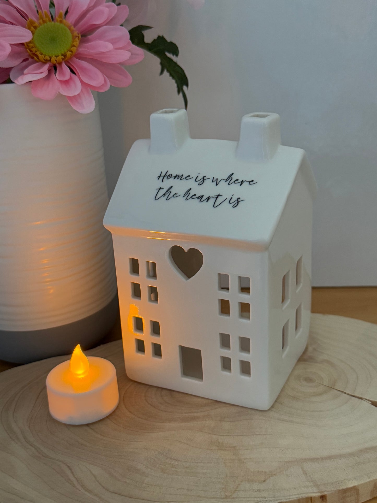 White ceramic candle house