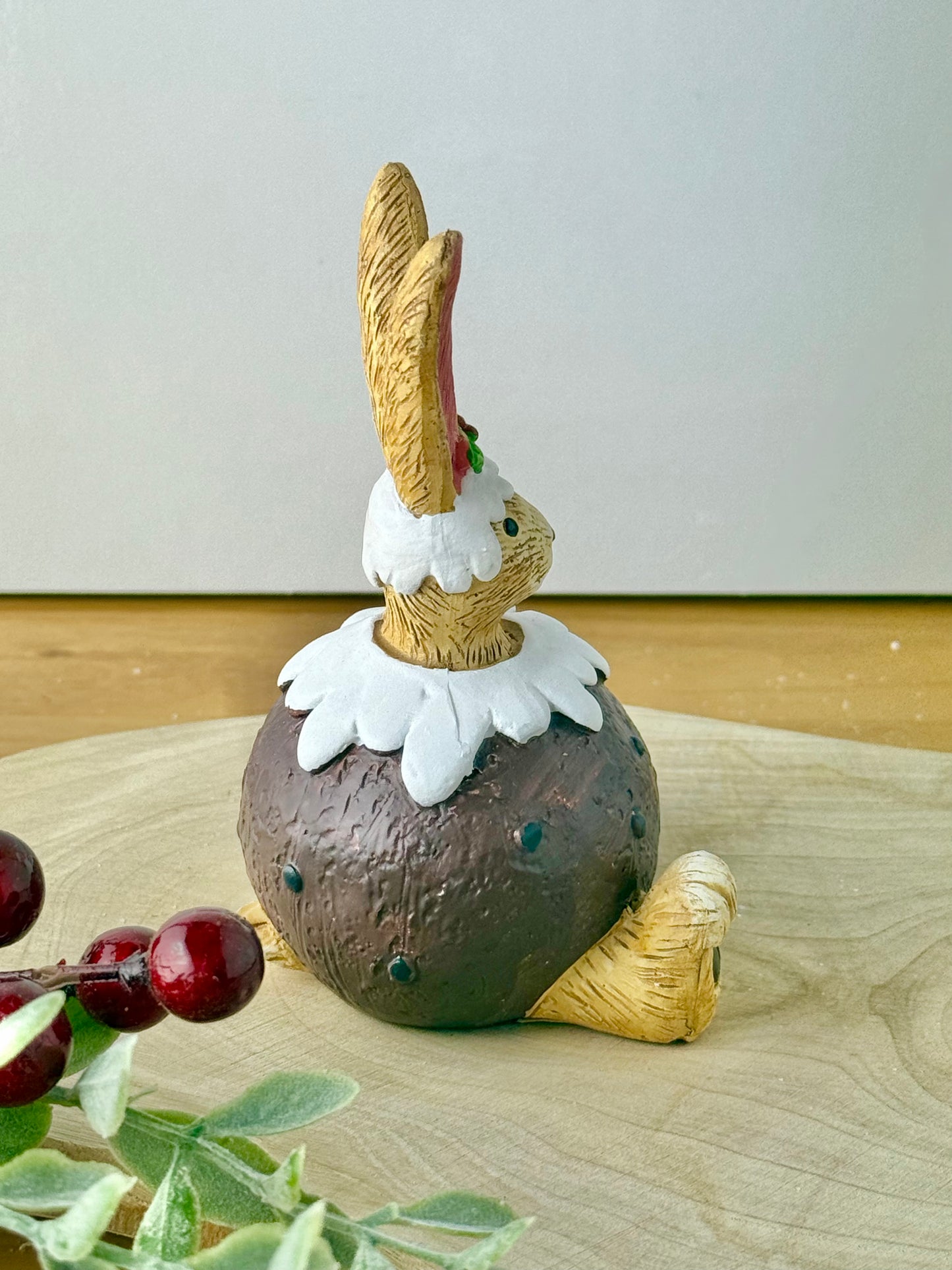 Jasper Rabbit wearing Christmas Pudding Costume