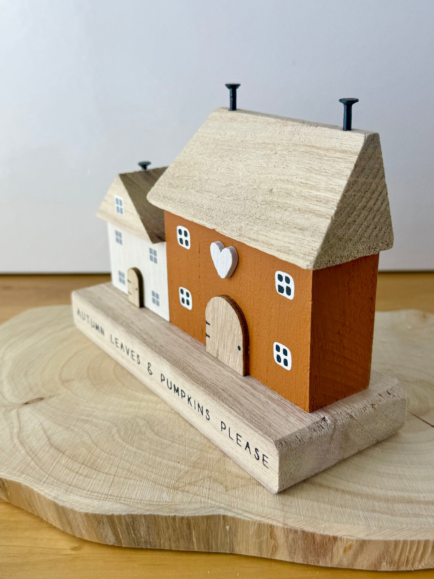 Autumn leaves & pumpkin wooden houses
