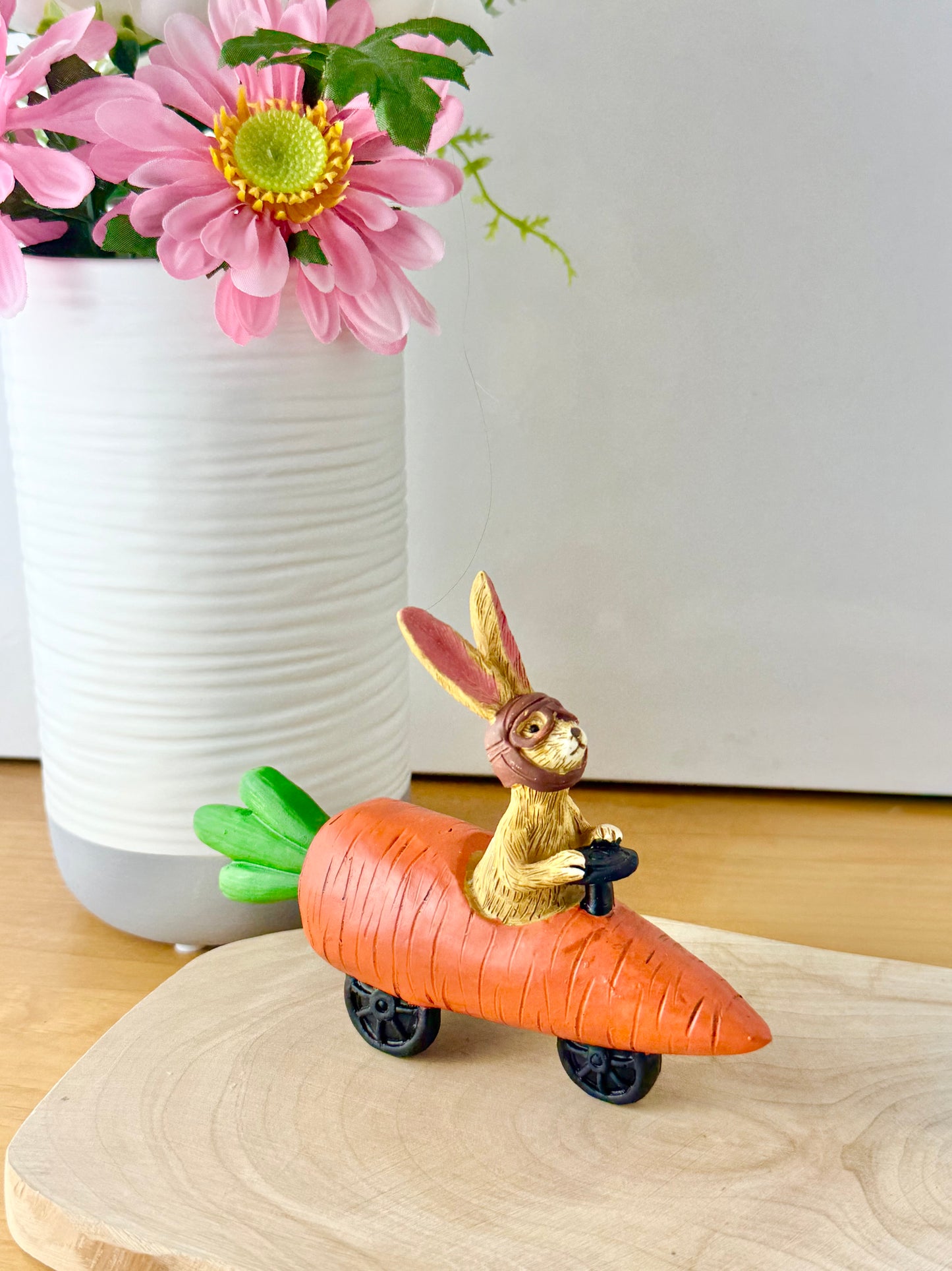 Jasper Rabbit sitting in a carrot car