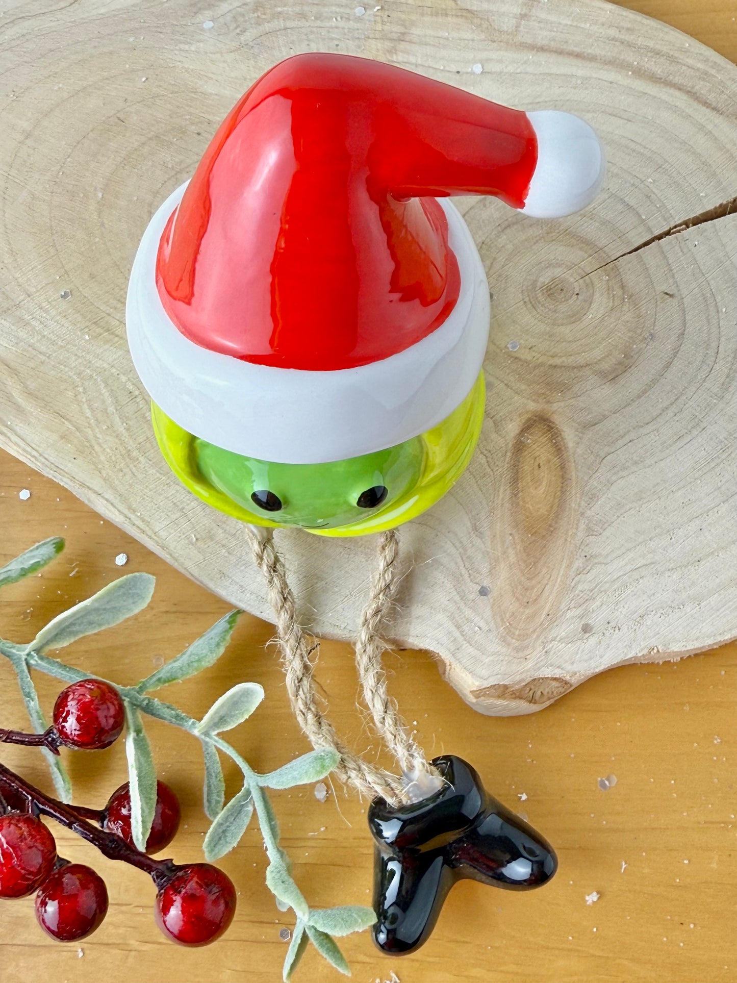 Green Sprout Shelf Sitter with dangley legs