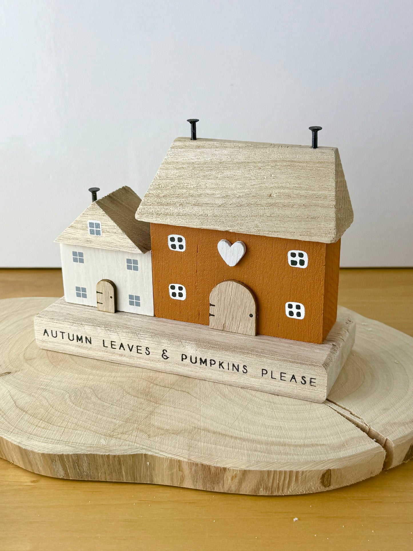 Autumn leaves & pumpkin wooden houses