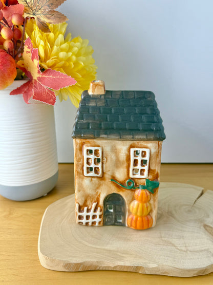 Autumn house with Pumpkins