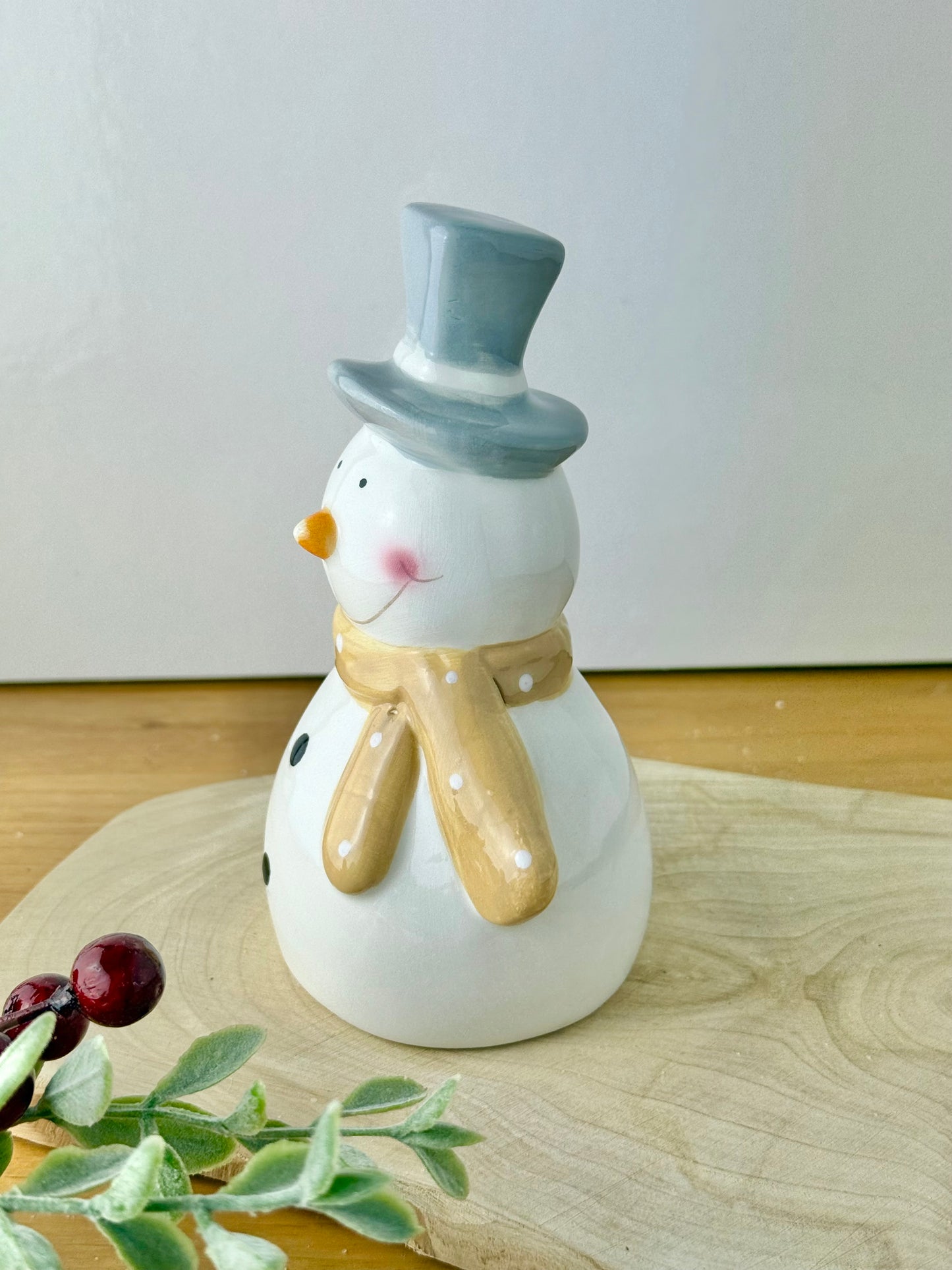 Snowman Wearing a Grey Top Hat