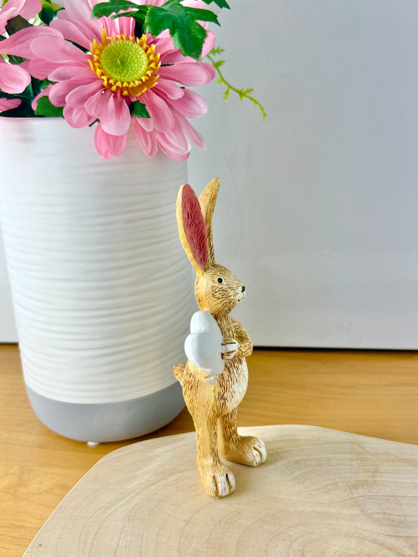 Jasper Rabbit holding a white heart