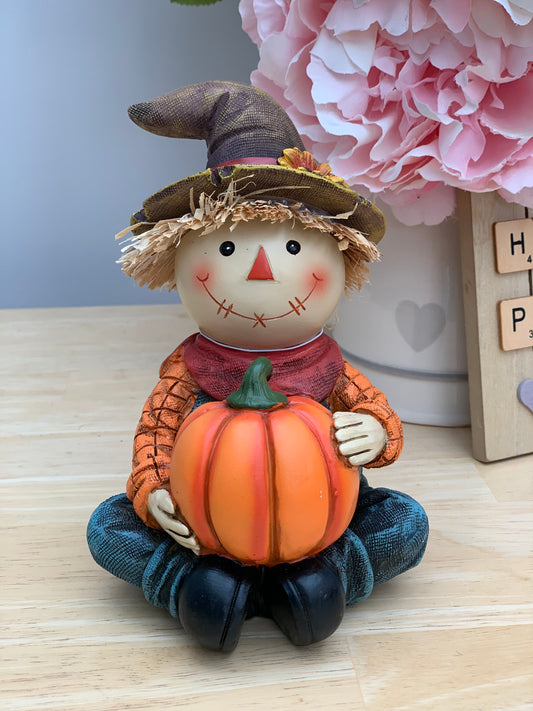 Harvest Scarecrow with Pumpkin