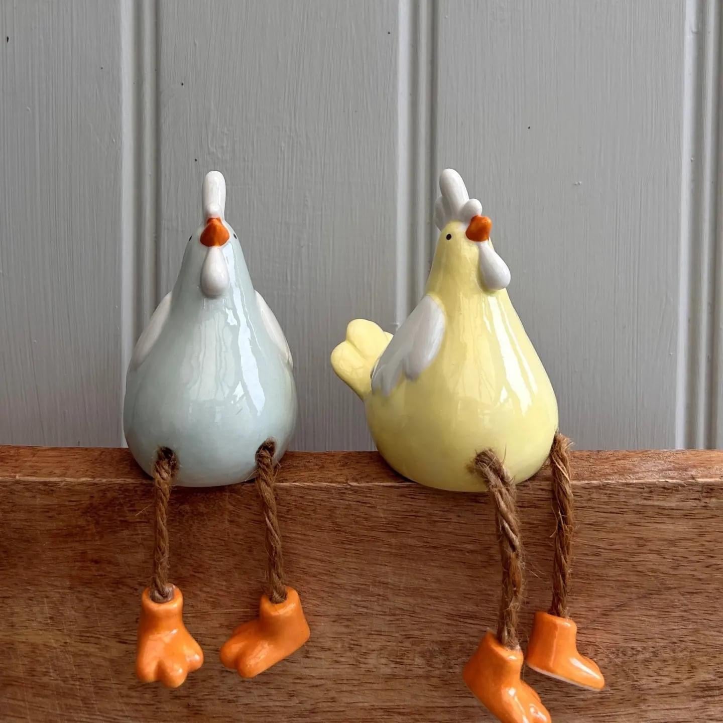 Porcelain Sitting Chickens with dangley legs