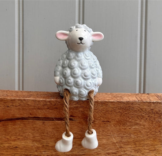 Porcelain Sitting Sheep with dangley legs