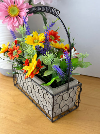 Yellow & orange Forever Flowers in a Wire Basket