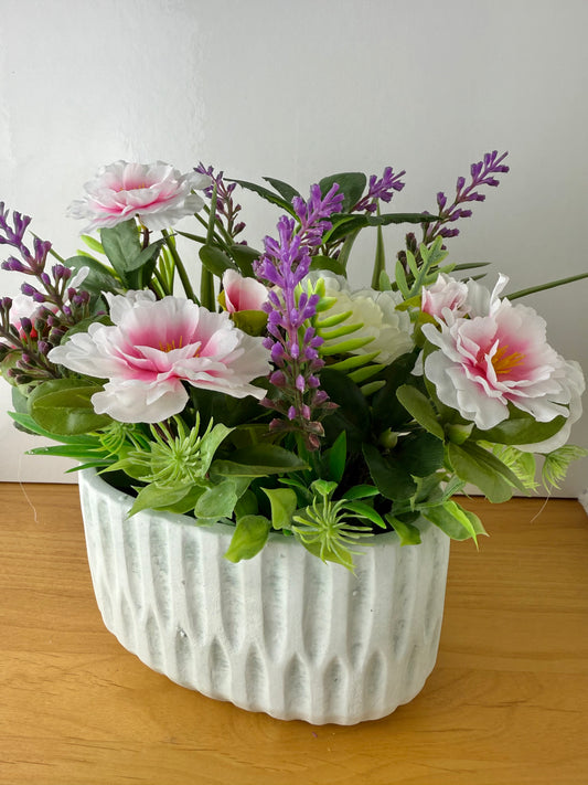 Pink Forever Flower & foiliage display within plant pot