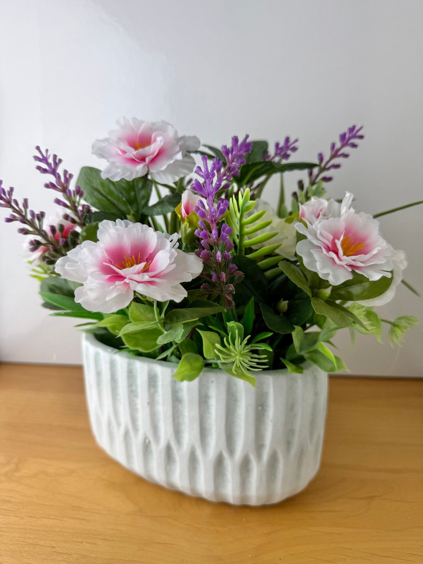 Pink Forever Flower & foiliage display within plant pot