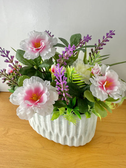 Pink Forever Flower & foiliage display within plant pot