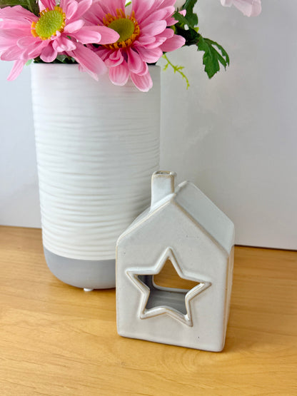 Grey glazed t-light holder - shape of house with cutout star