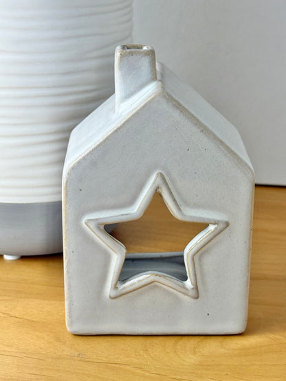 Grey glazed t-light holder - shape of house with cutout star
