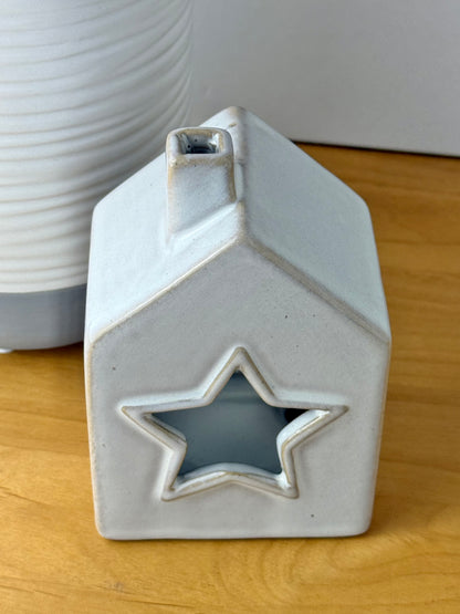 Grey glazed t-light holder - shape of house with cutout star
