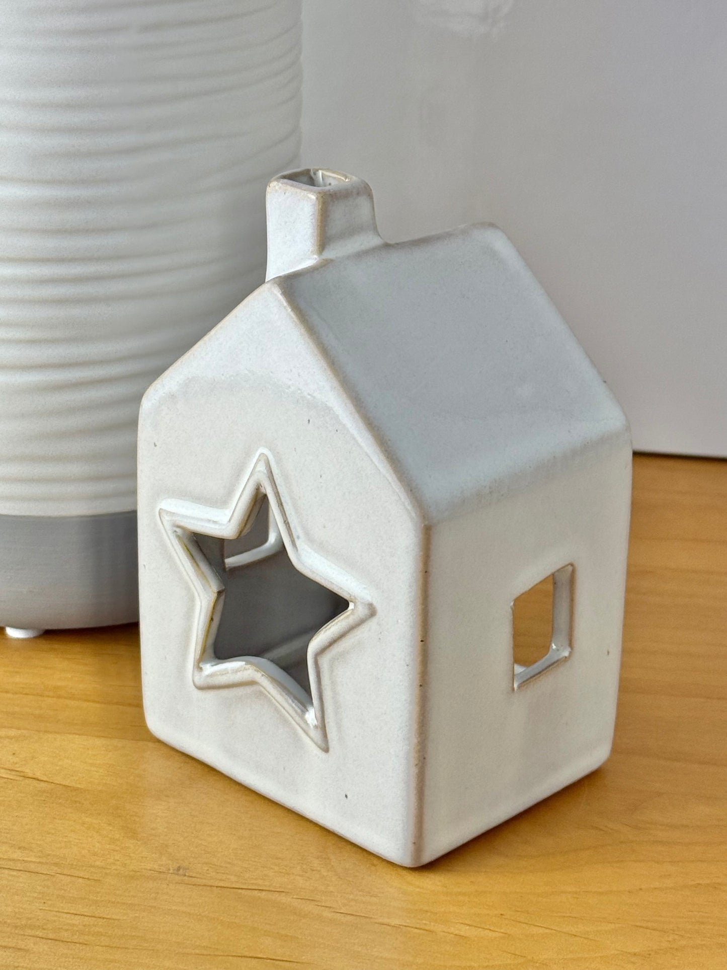 Grey glazed t-light holder - shape of house with cutout star