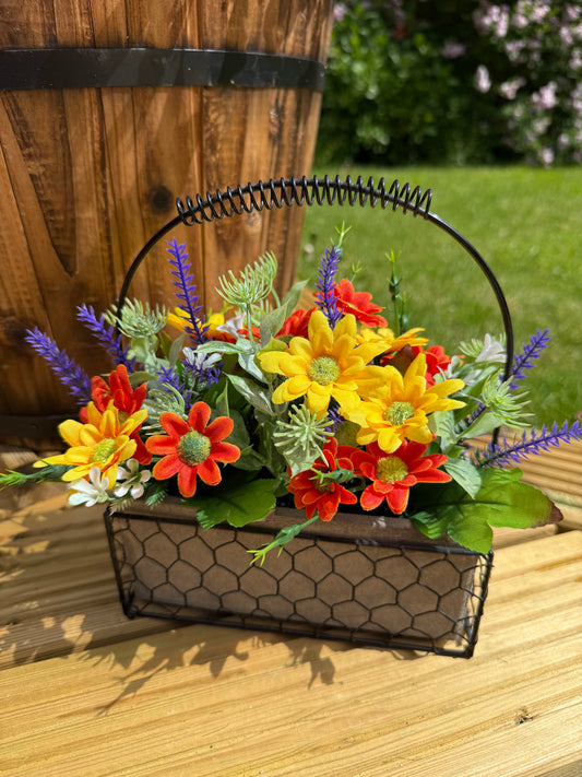 Yellow & orange Forever Flowers in a Wire Basket