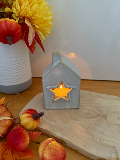 Grey glazed t-light holder - shape of house with cutout star
