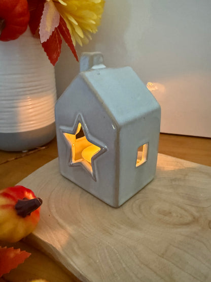Grey glazed t-light holder - shape of house with cutout star