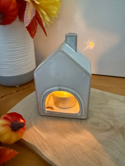 Grey glazed t-light holder - shape of house with cutout star