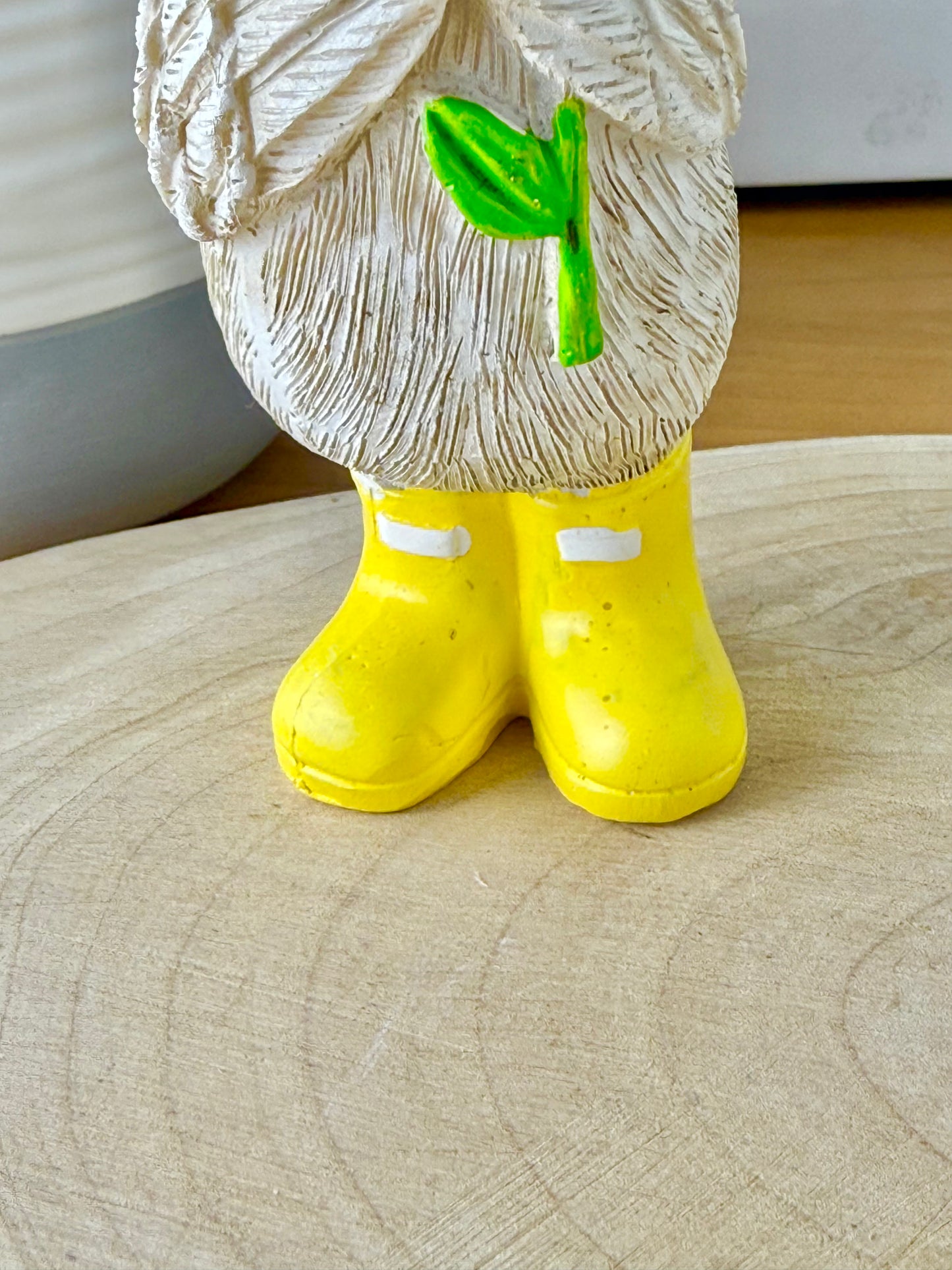 Duck wearing yellow wellington boots & sunflower