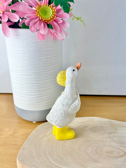 Duck wearing yellow wellington boots & sunflower