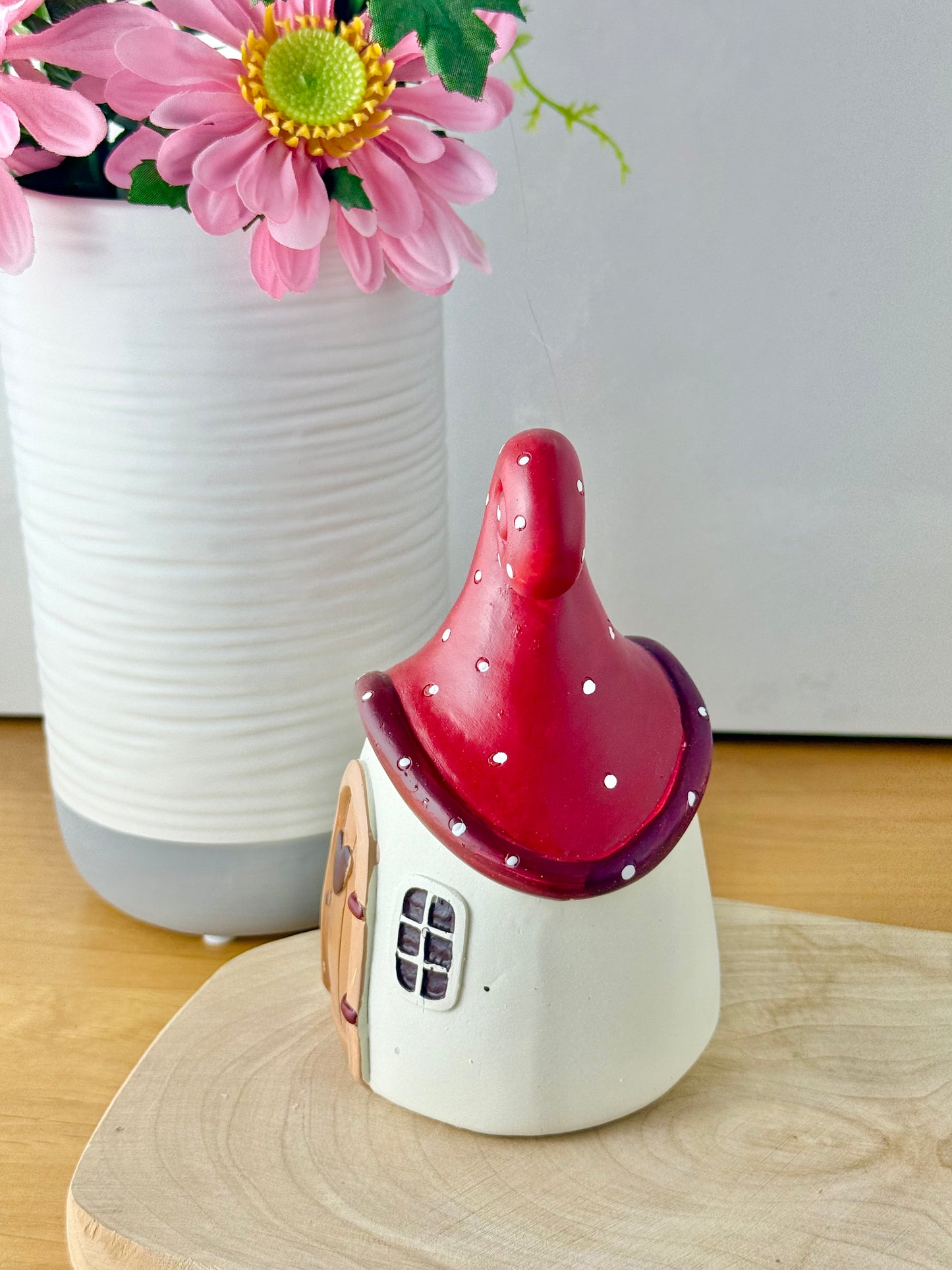 Mushroom house with red polka dot roof & heart door