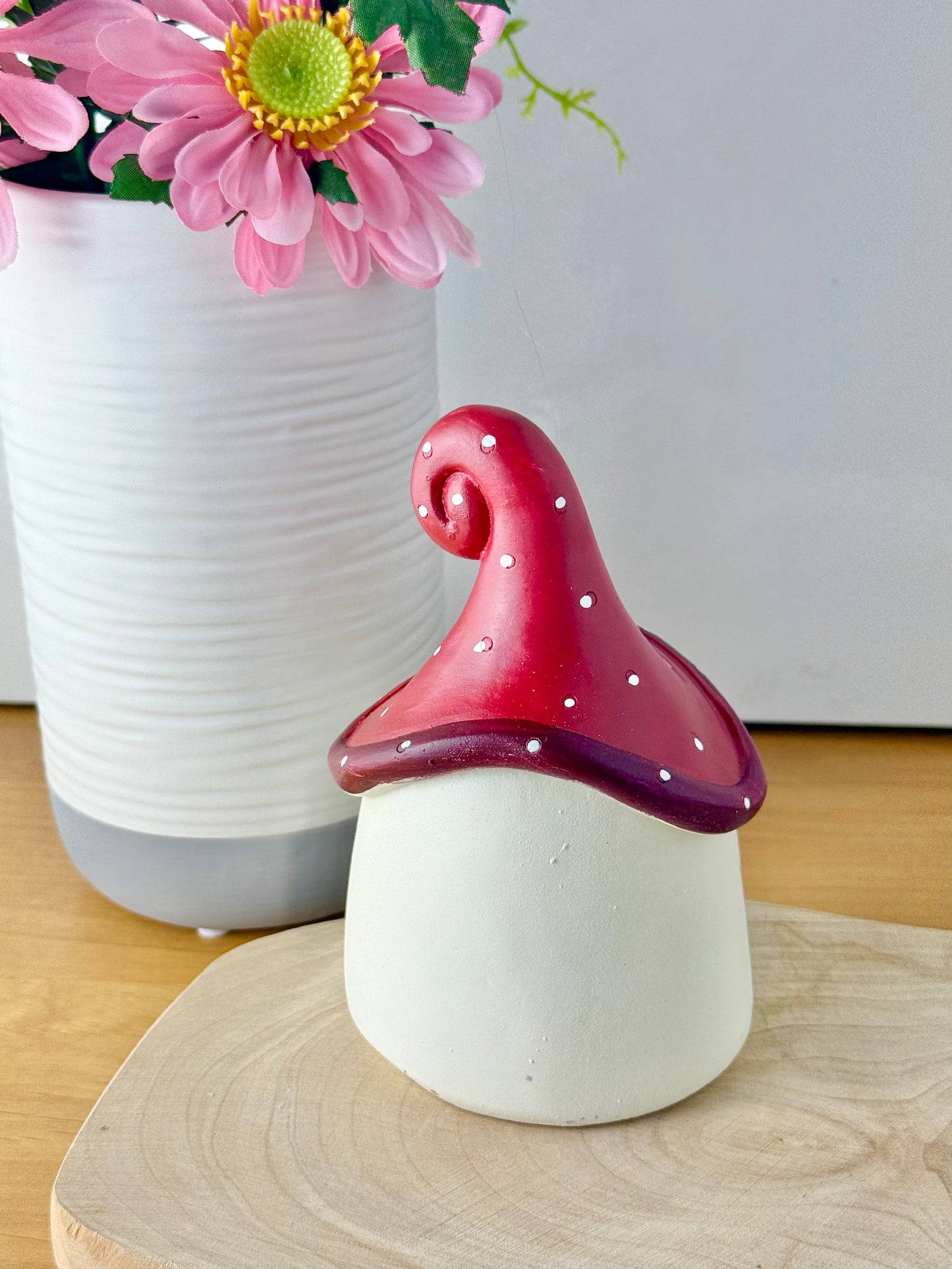 Mushroom house with red polka dot roof & heart door