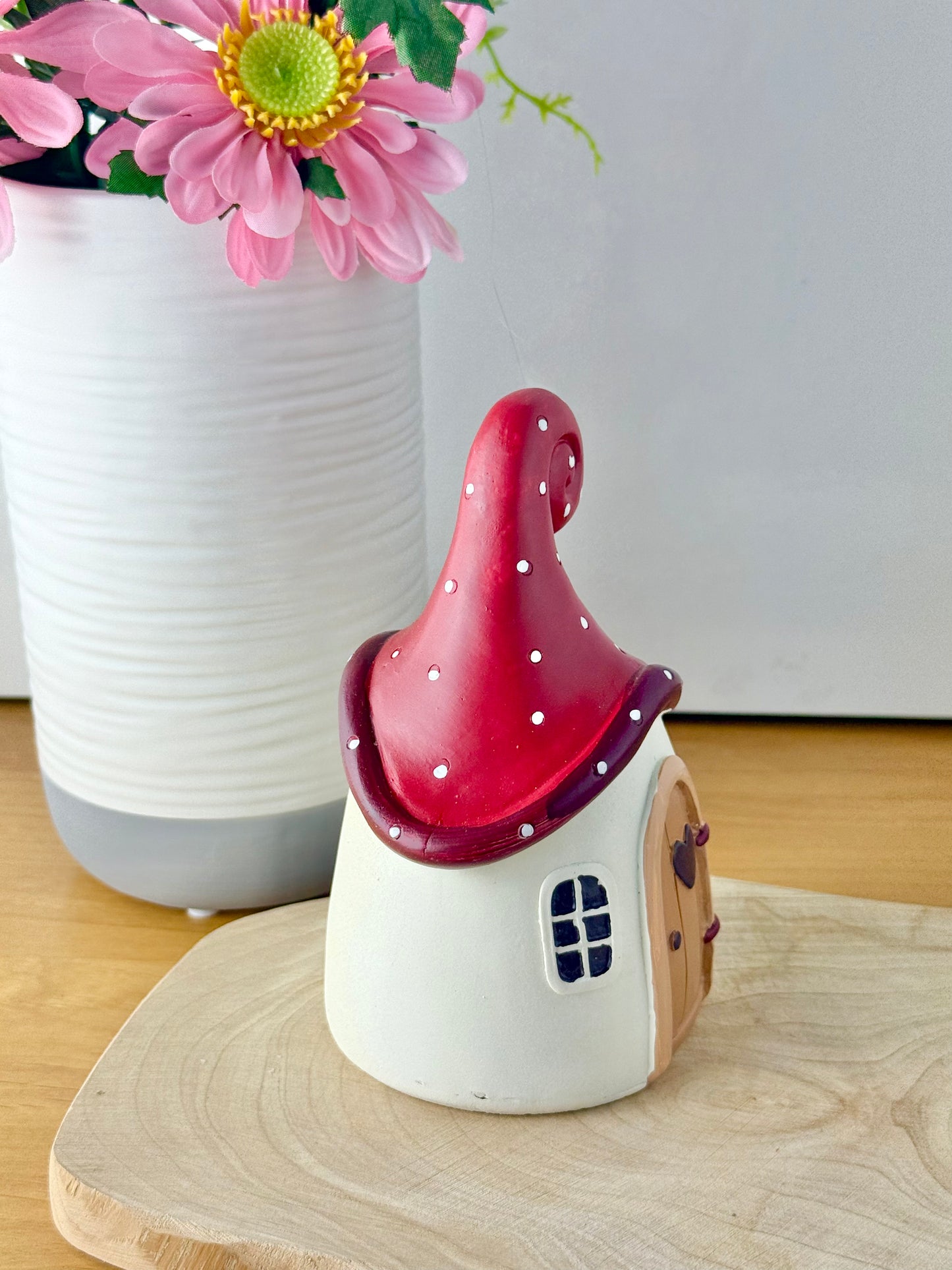 Mushroom house with red polka dot roof & heart door