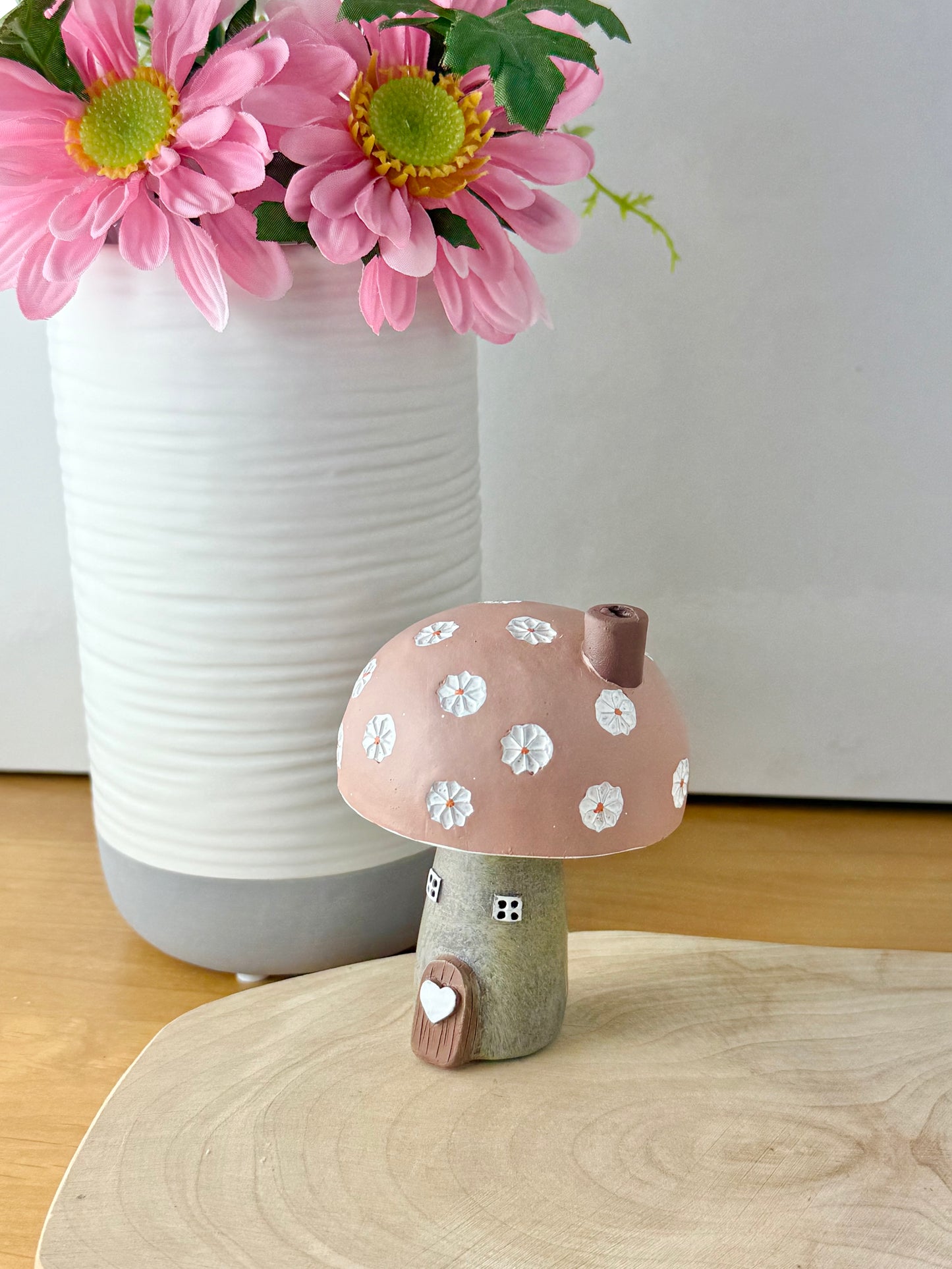 Pink daisy mushroom house