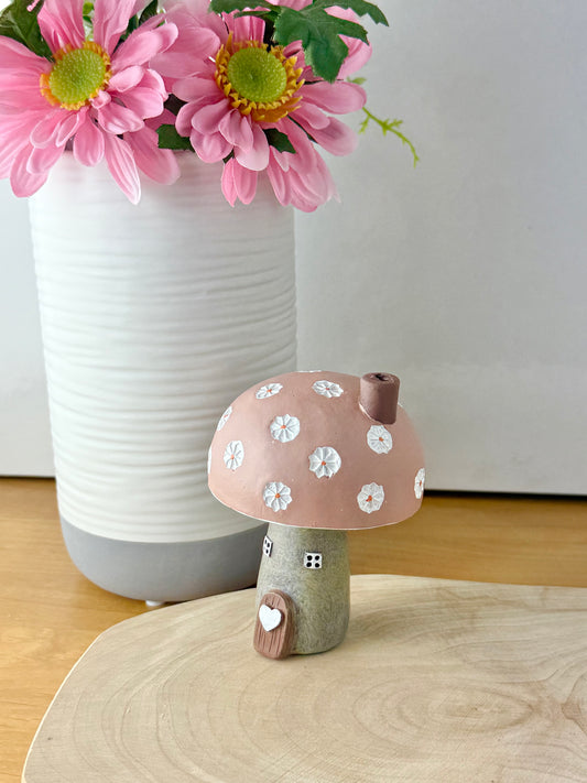 Pink daisy mushroom house