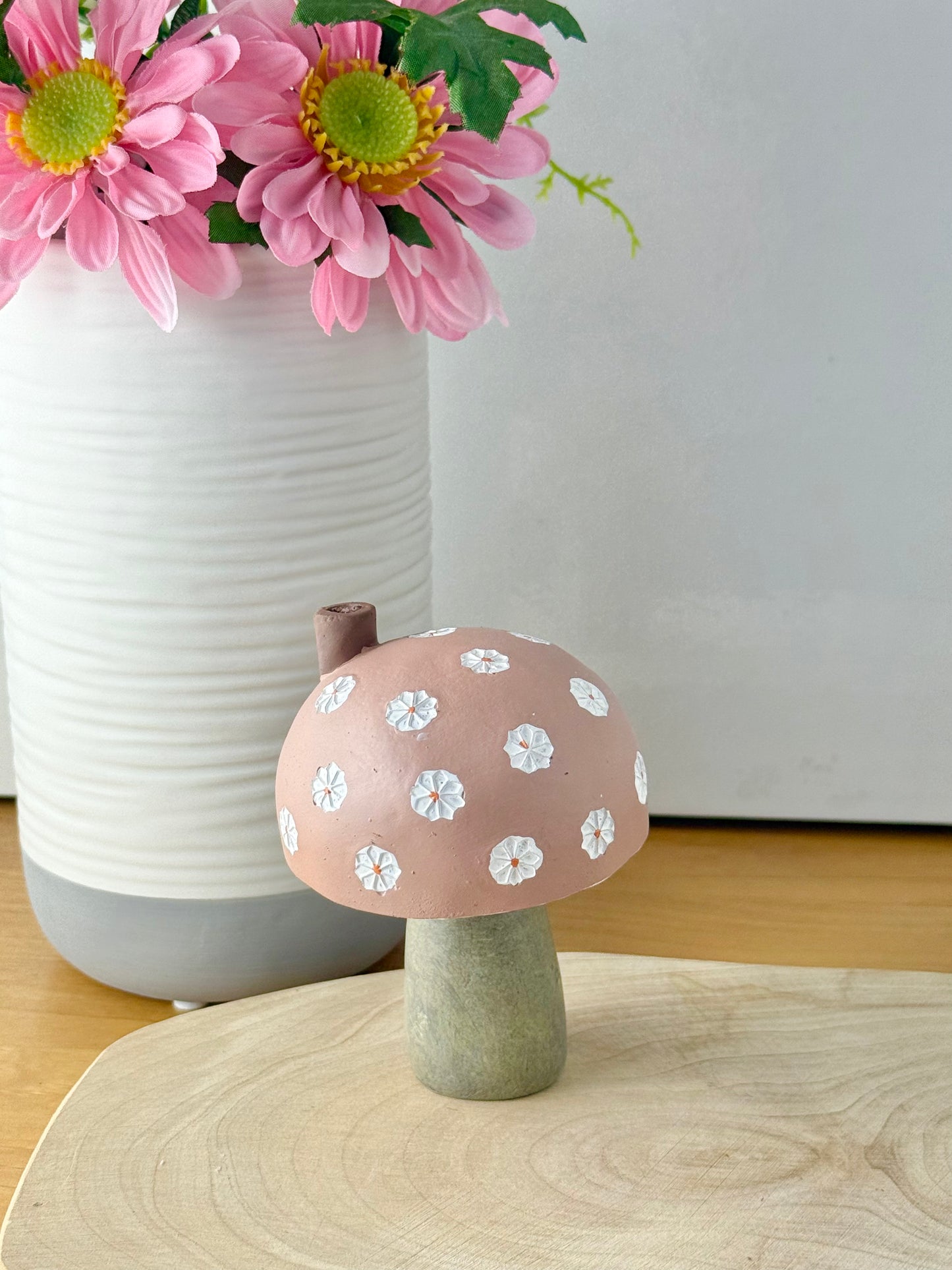 Pink daisy mushroom house