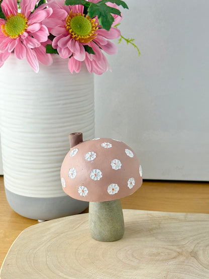 Pink daisy mushroom house