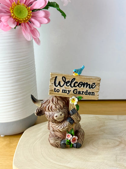 Highland Cows with Signs