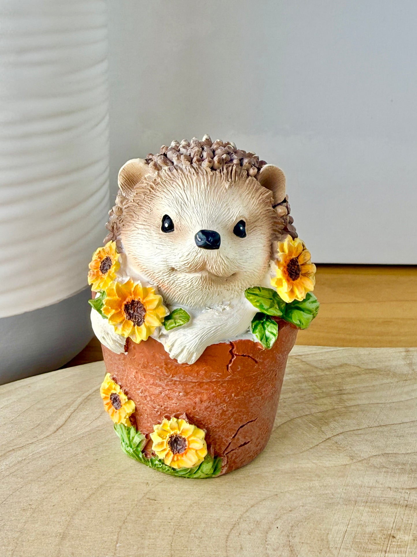 Hedgehog sat in a Plant Pot