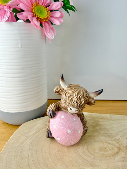 Highland Cow with pink polka dot egg