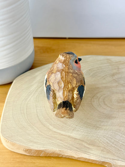 Carved Robin statue
