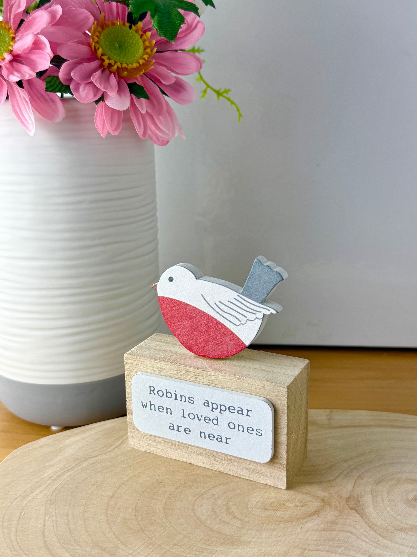Robins appear wooden block sign