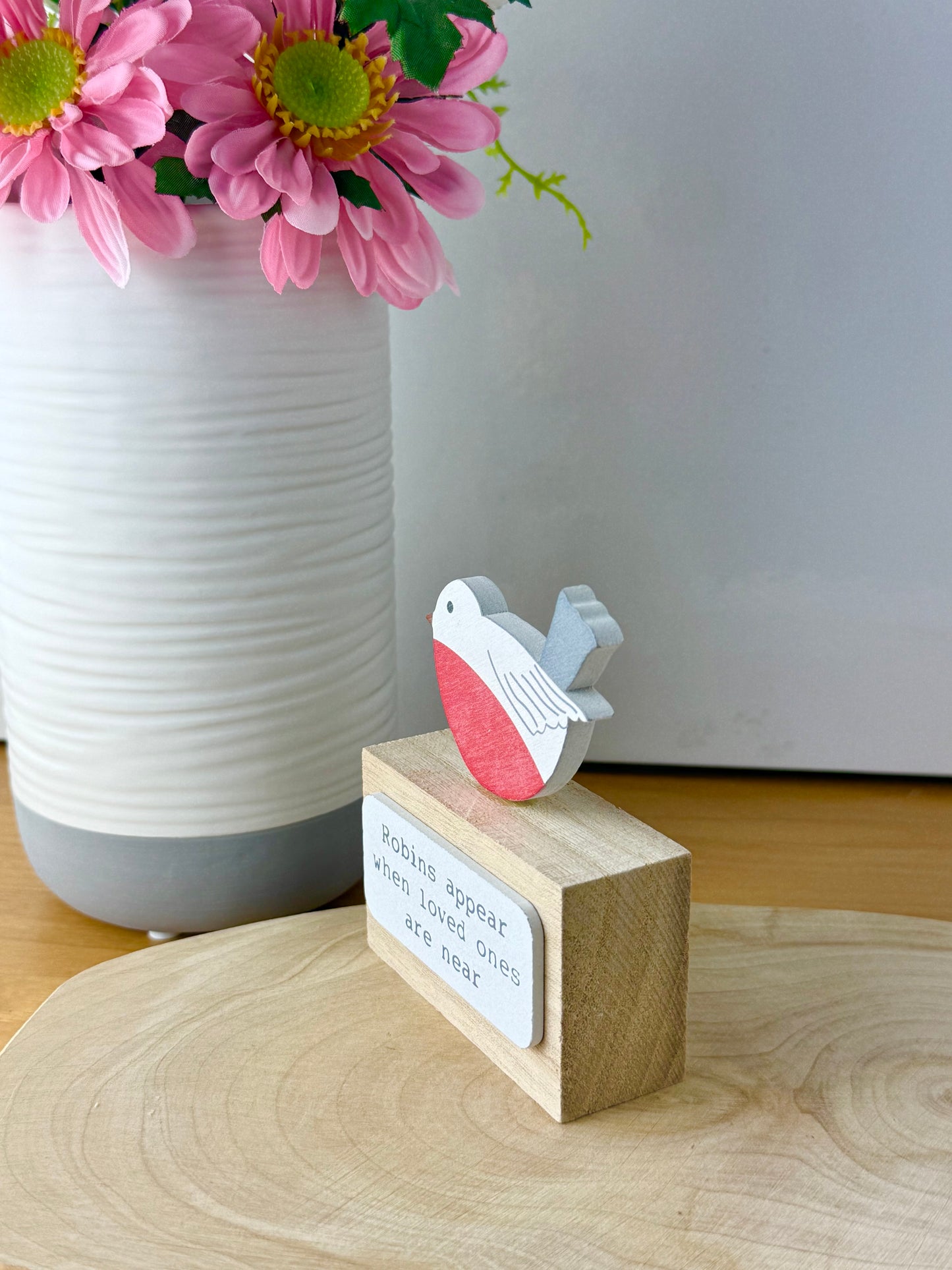 Robins appear wooden block sign