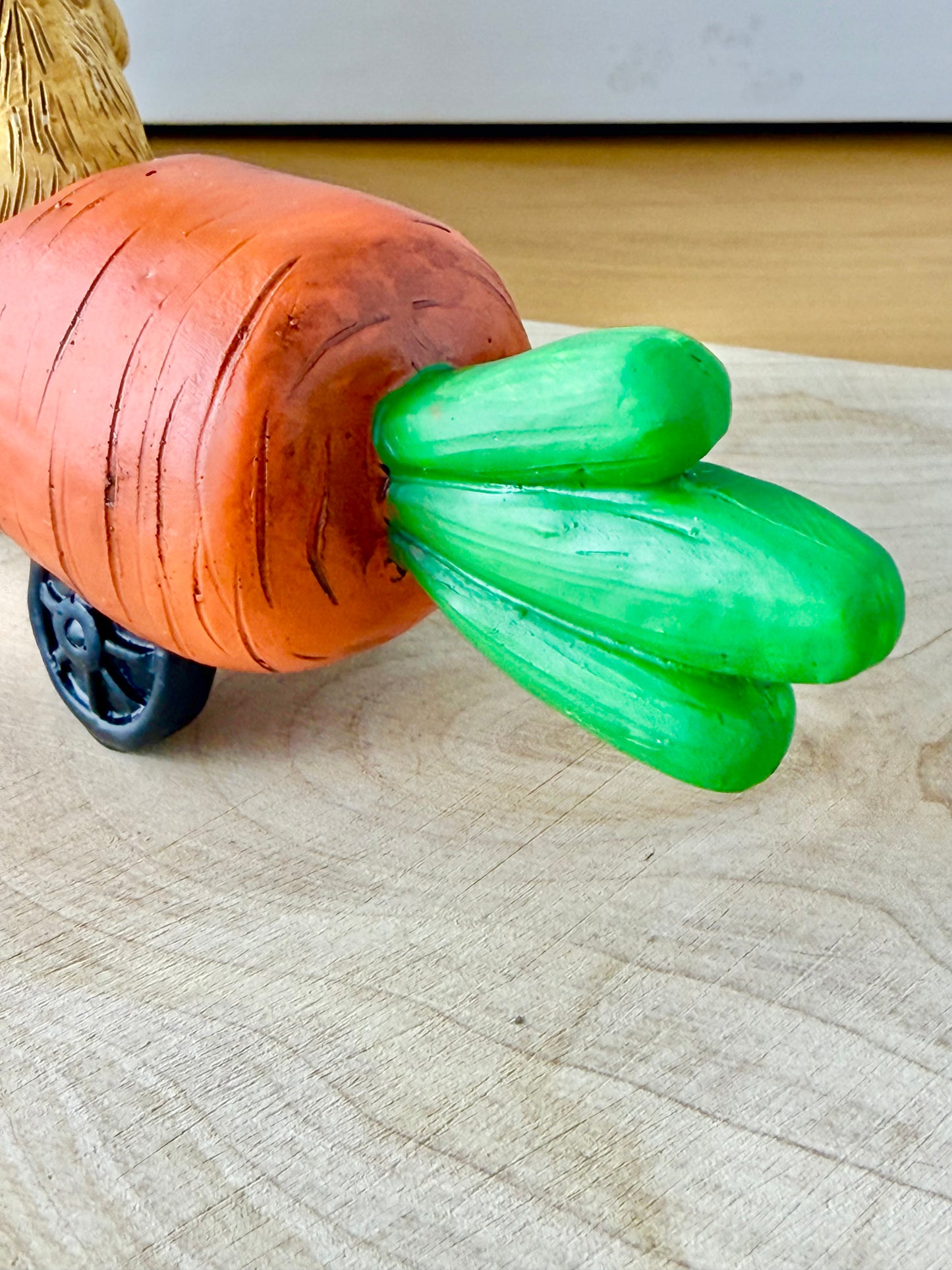 Jasper Rabbit sitting in a carrot car