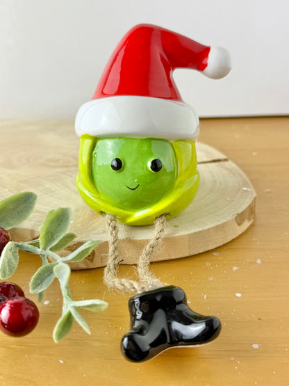 Green Sprout Shelf Sitter with dangley legs