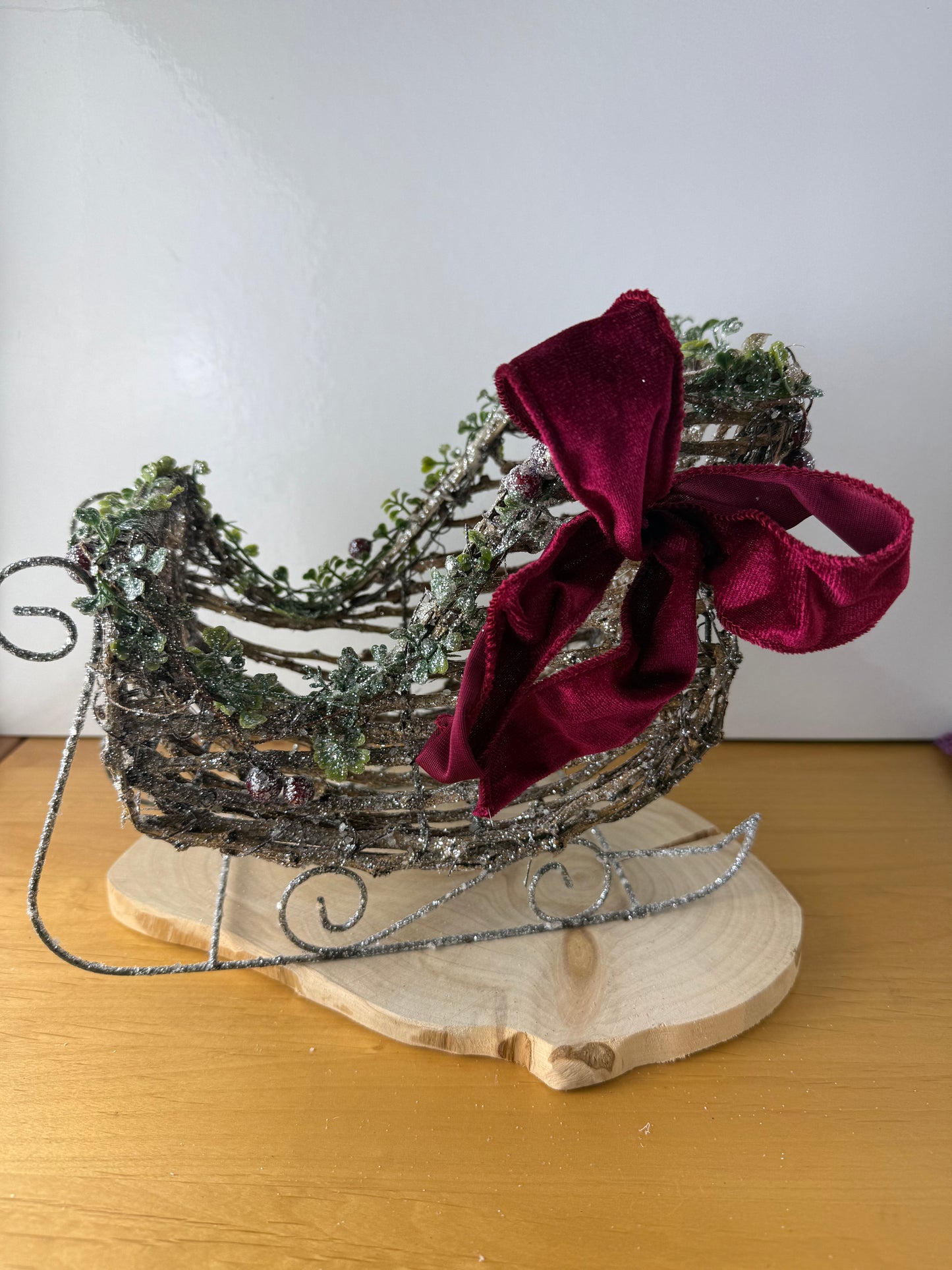 Wooden Christmas Sleigh with Red velvet bow