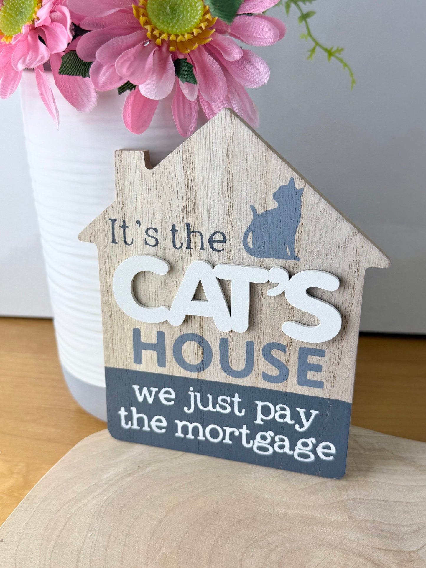 It's the Cats House we just pay the mortgage wooden sign