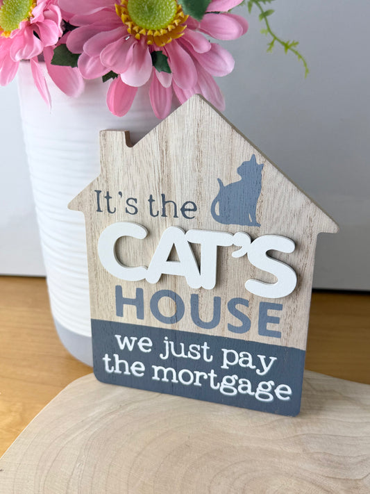 It's the Cats House we just pay the mortgage wooden sign