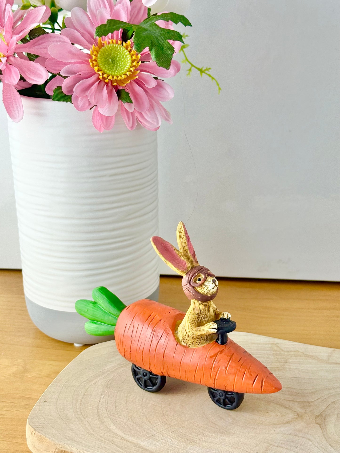 Jasper Rabbit sitting in a carrot car