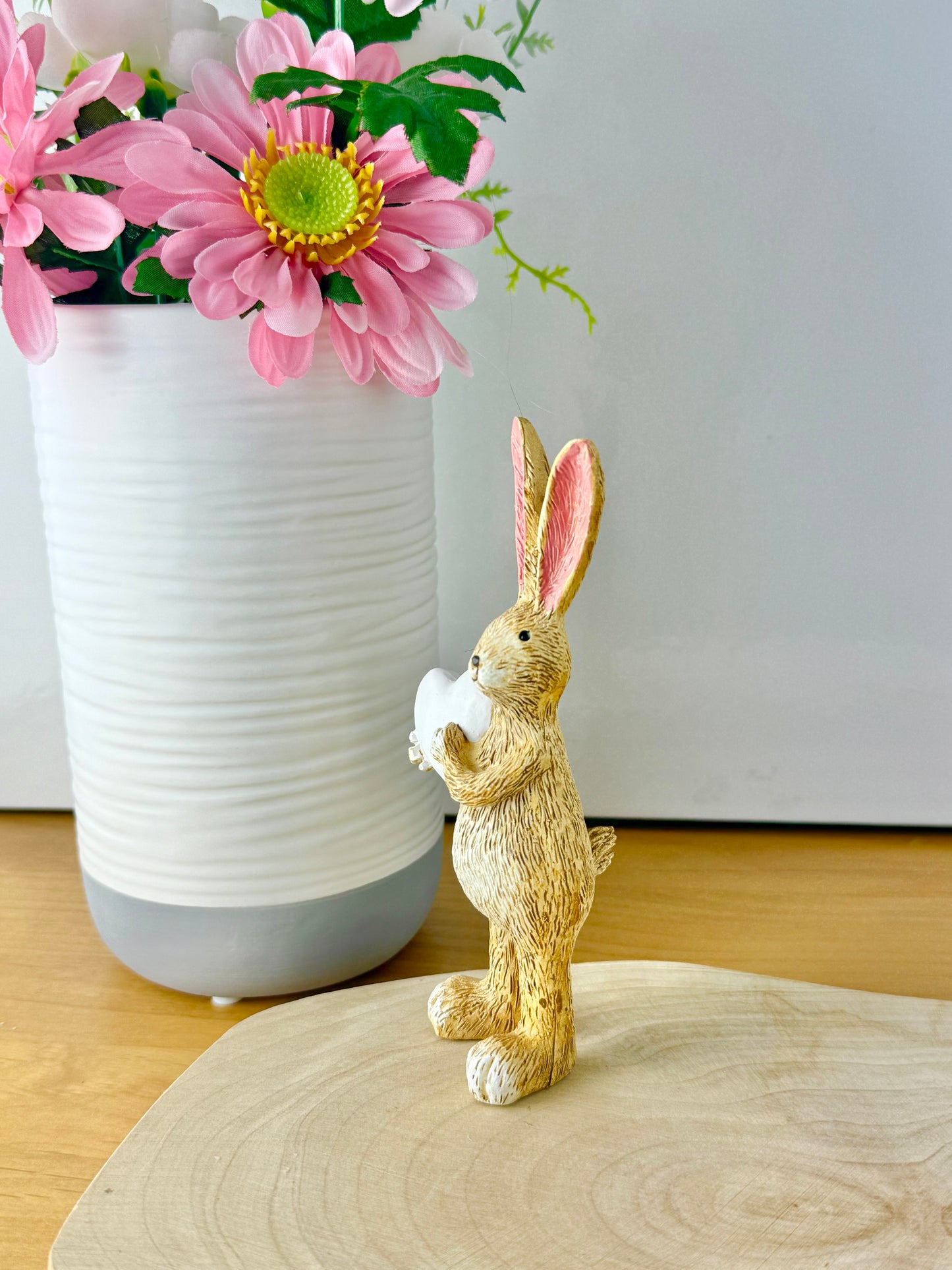 Jasper Rabbit holding a white heart
