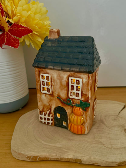 Autumn house with Pumpkins